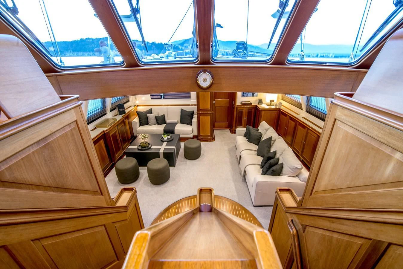 a room with a couch and a table aboard AVENTURA Yacht for Sale