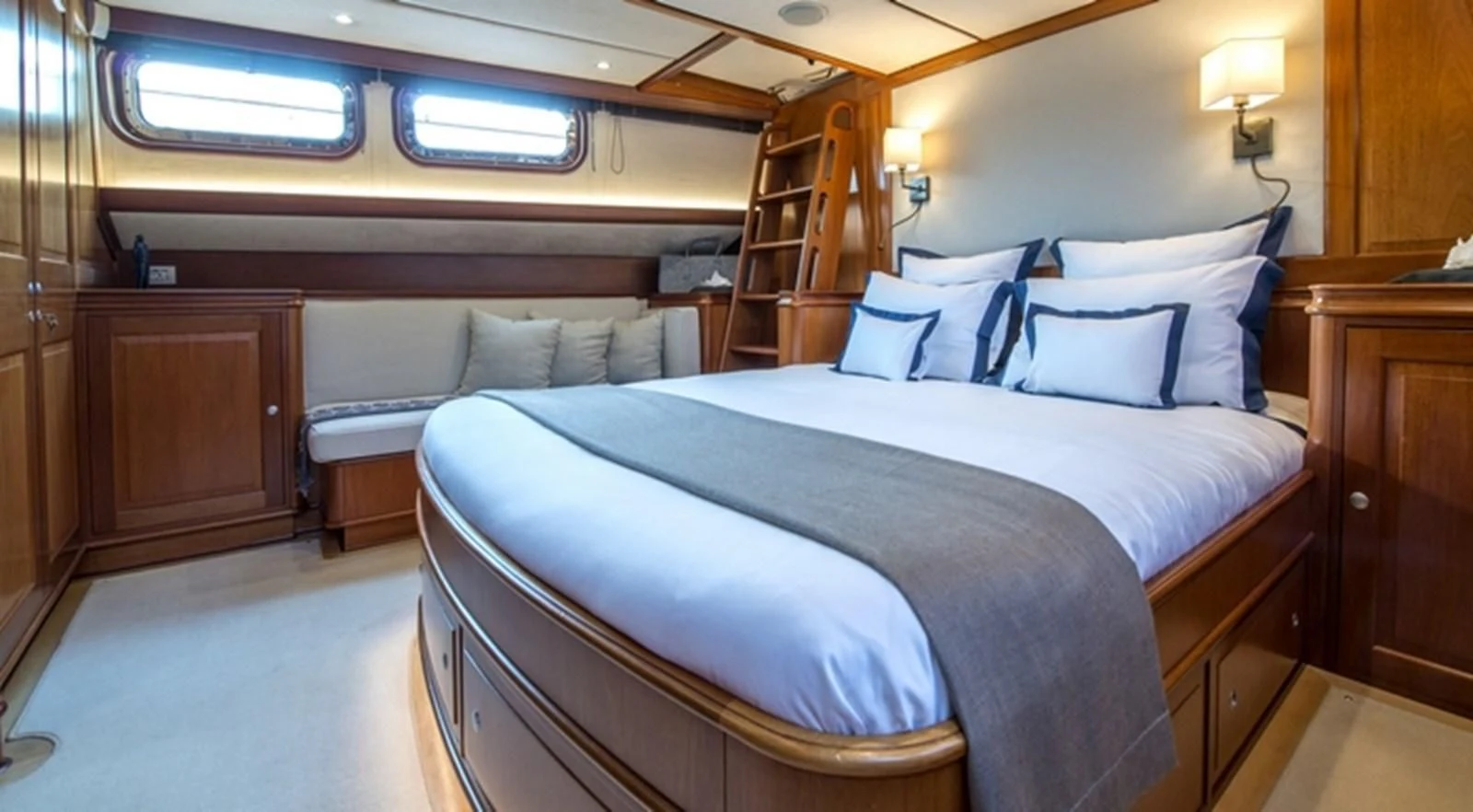 a bed in a room aboard AVENTURA Yacht for Sale