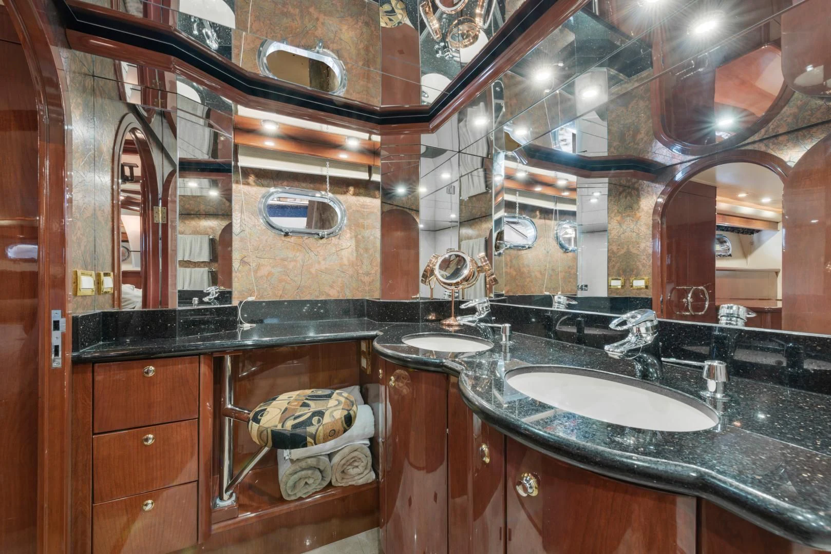 a bathroom with a sink and a mirror aboard CLEW LESS Yacht for Sale
