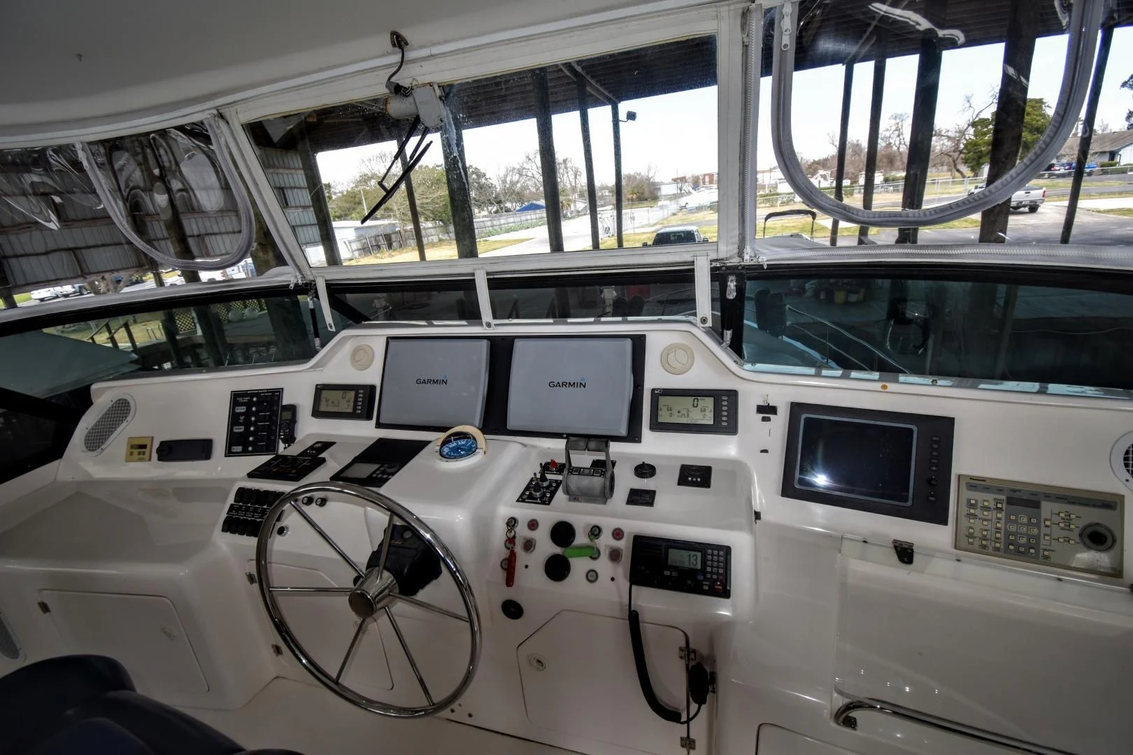 inside of a white car aboard CLEW LESS Yacht for Sale