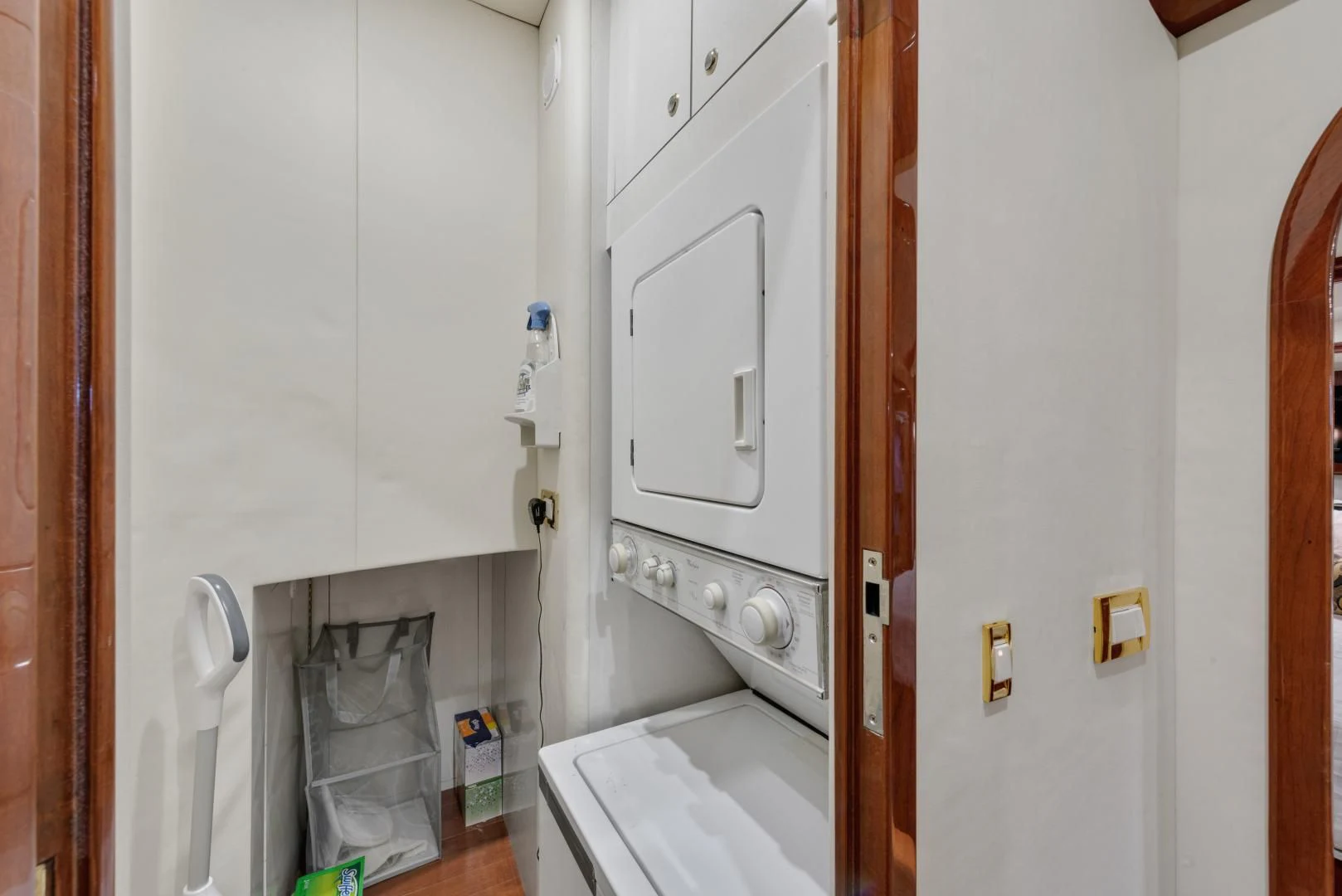 a white cabinet in a kitchen aboard CLEW LESS Yacht for Sale