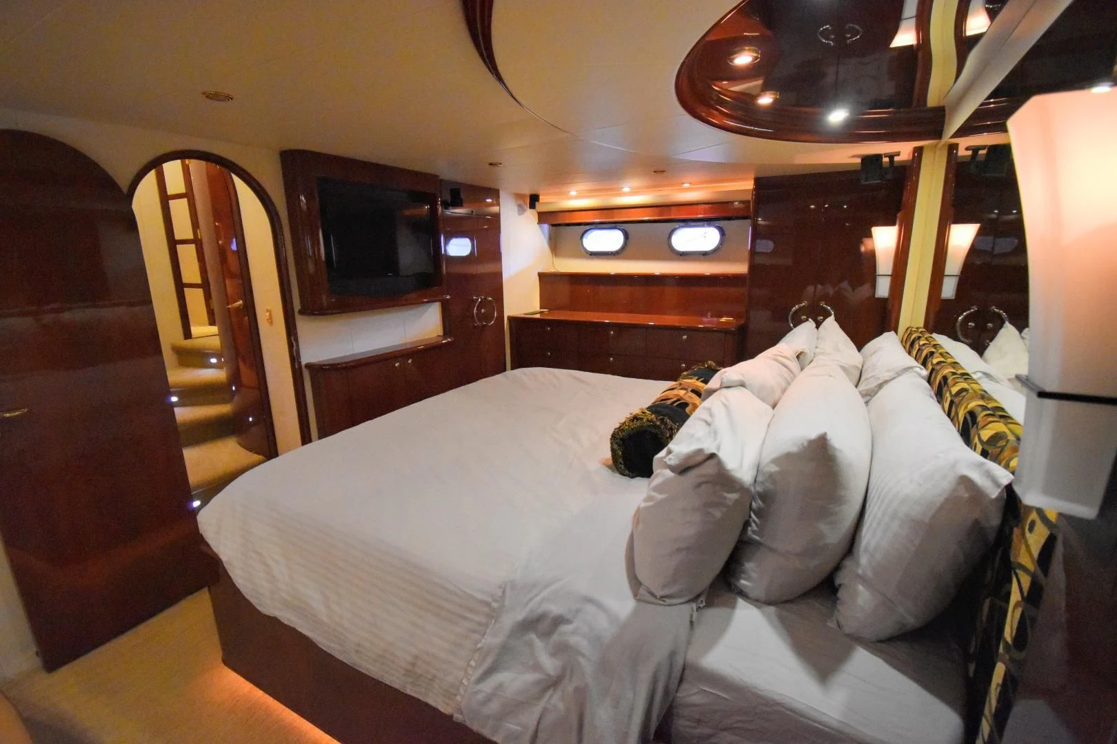 a bed with white pillows aboard CLEW LESS Yacht for Sale