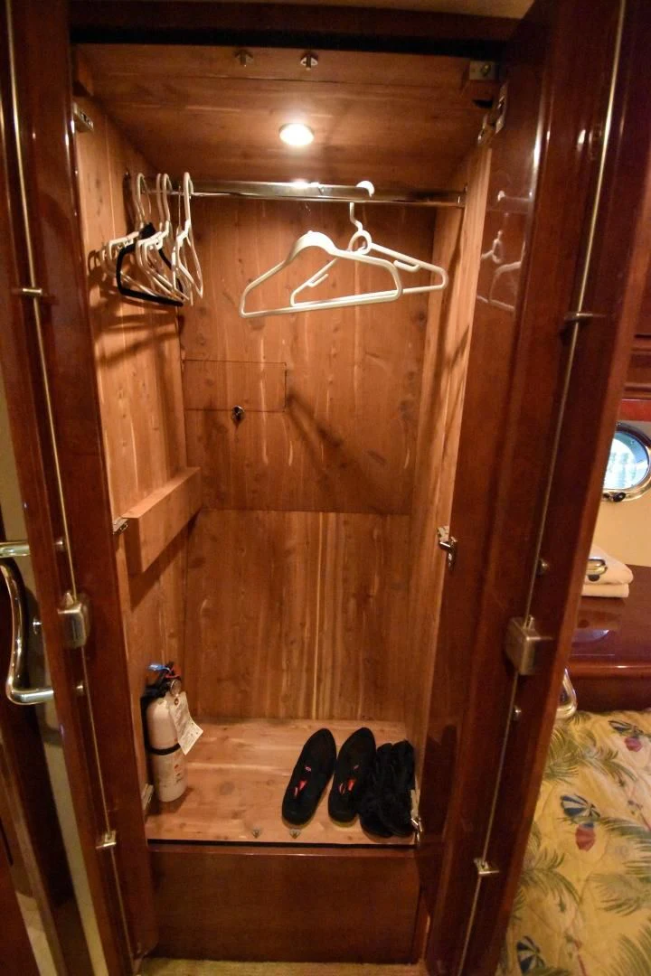 a shower with a sink and a mirror aboard CLEW LESS Yacht for Sale