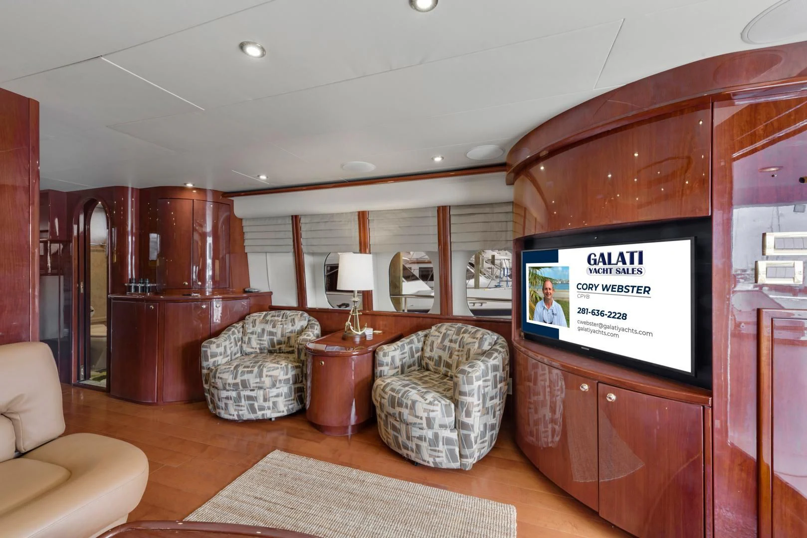 a room with a chair and a table and a chair aboard CLEW LESS Yacht for Sale