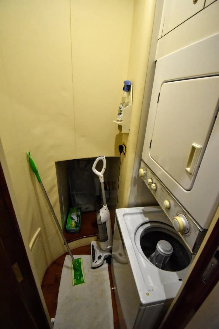 a washer and dryer in a bathroom aboard CLEW LESS Yacht for Sale