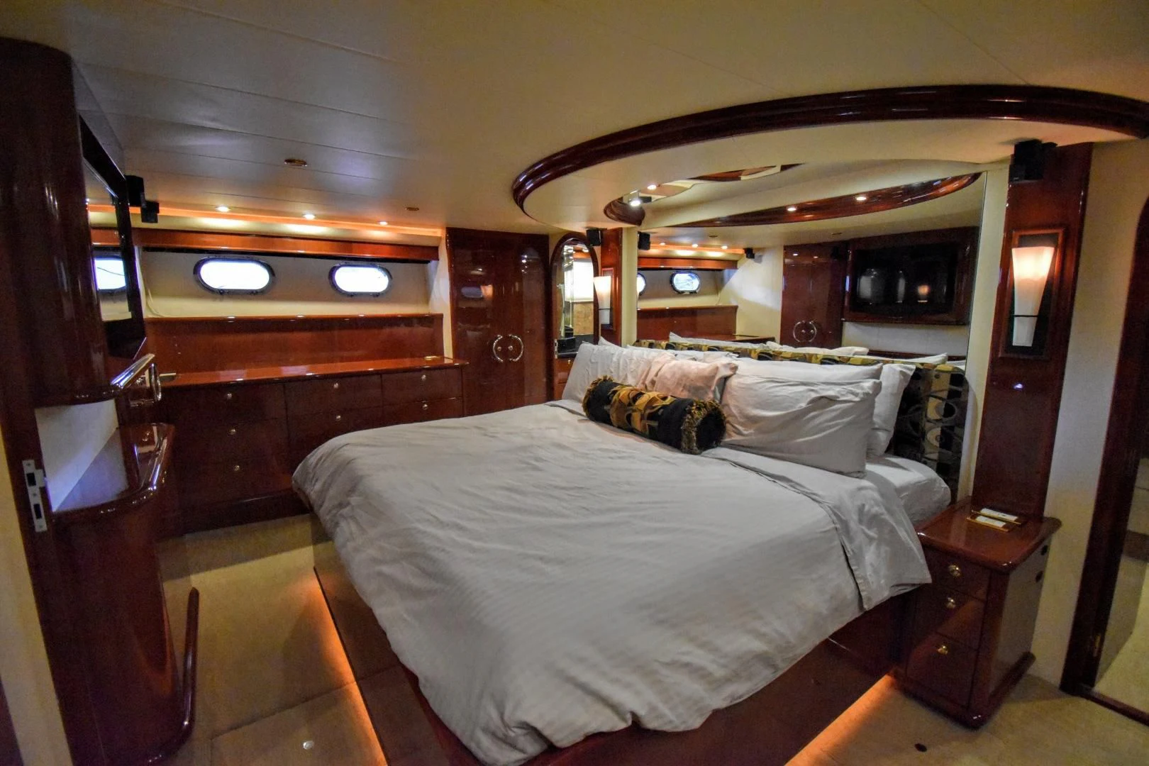 a bedroom with a large bed aboard CLEW LESS Yacht for Sale