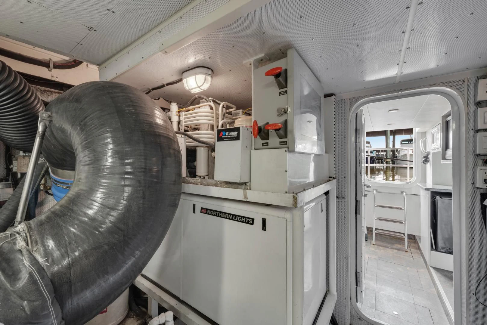 a room with a large machine aboard CLEW LESS Yacht for Sale