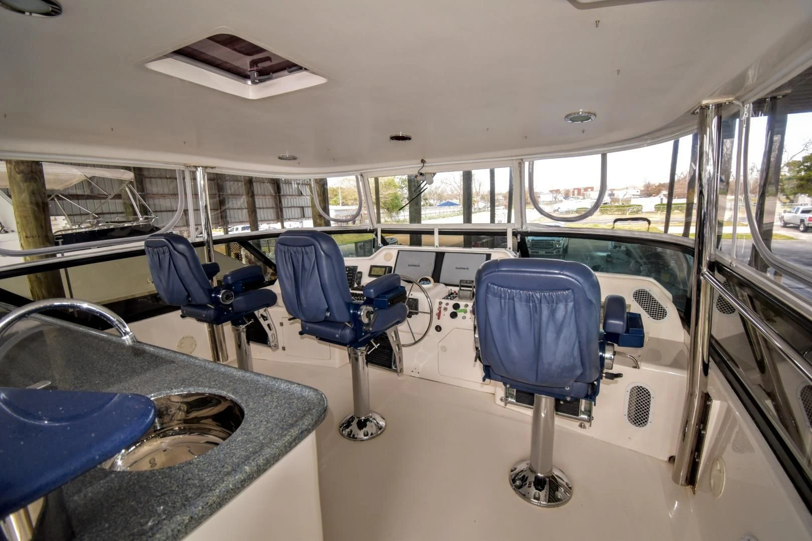 inside of a vehicle with chairs and tables aboard CLEW LESS Yacht for Sale