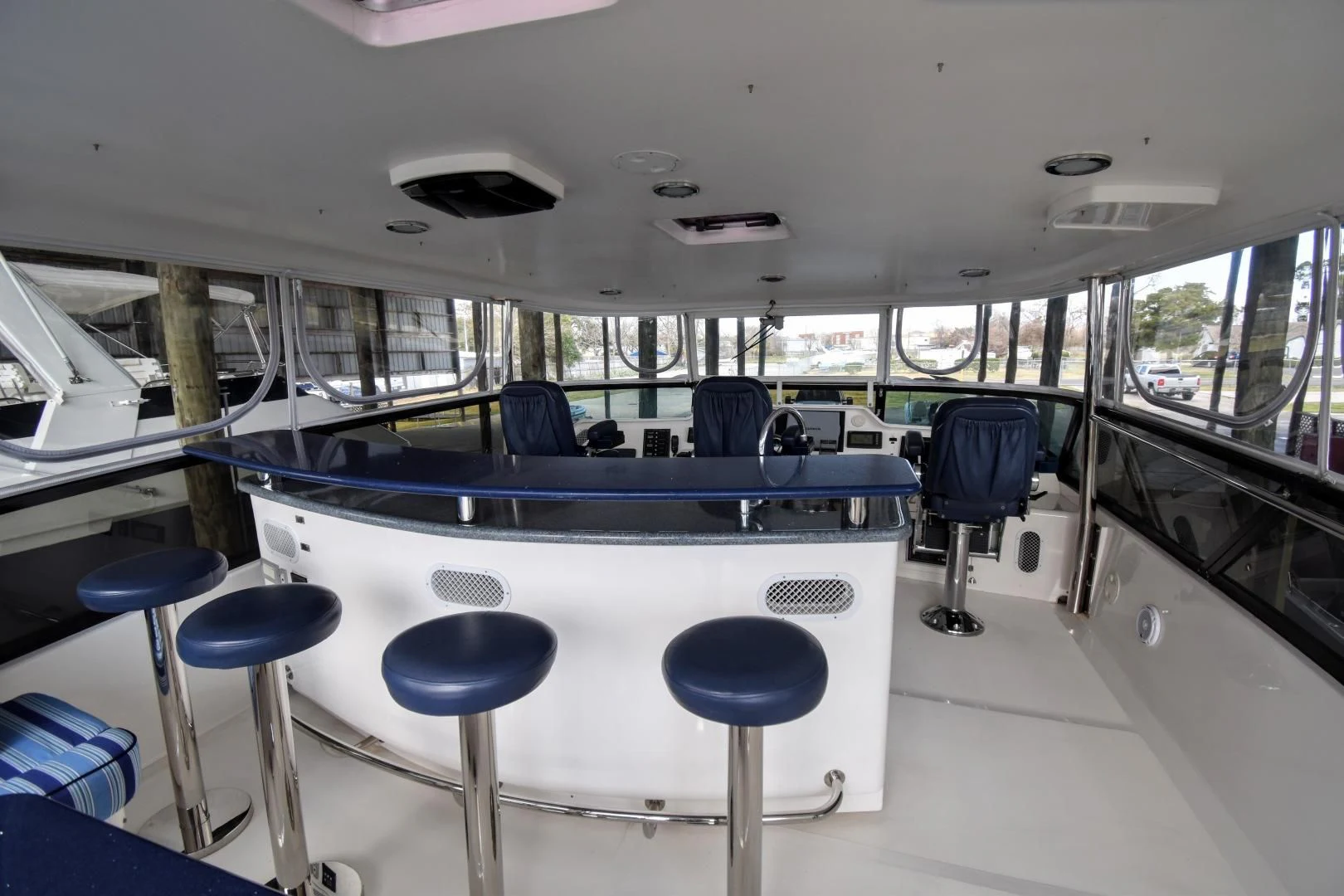 a vehicle with blue seats aboard CLEW LESS Yacht for Sale