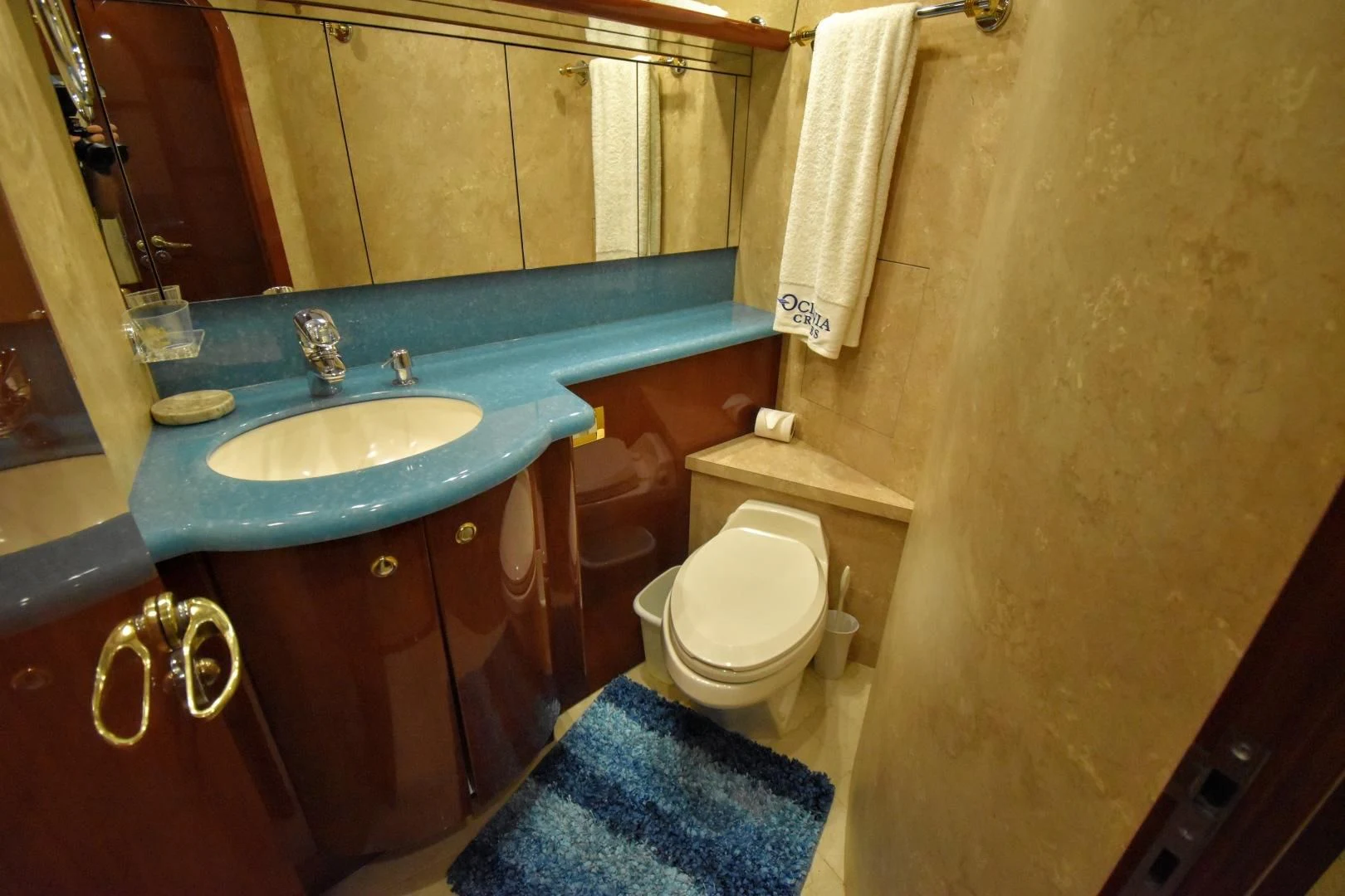a bathroom with a sink and toilet aboard CLEW LESS Yacht for Sale