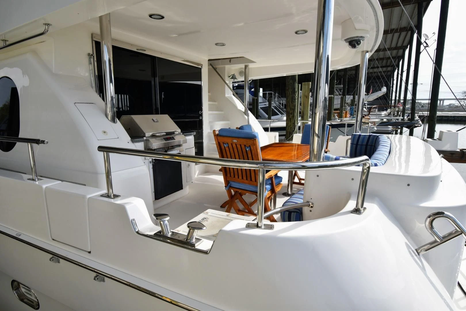 a room with a table and chairs aboard CLEW LESS Yacht for Sale