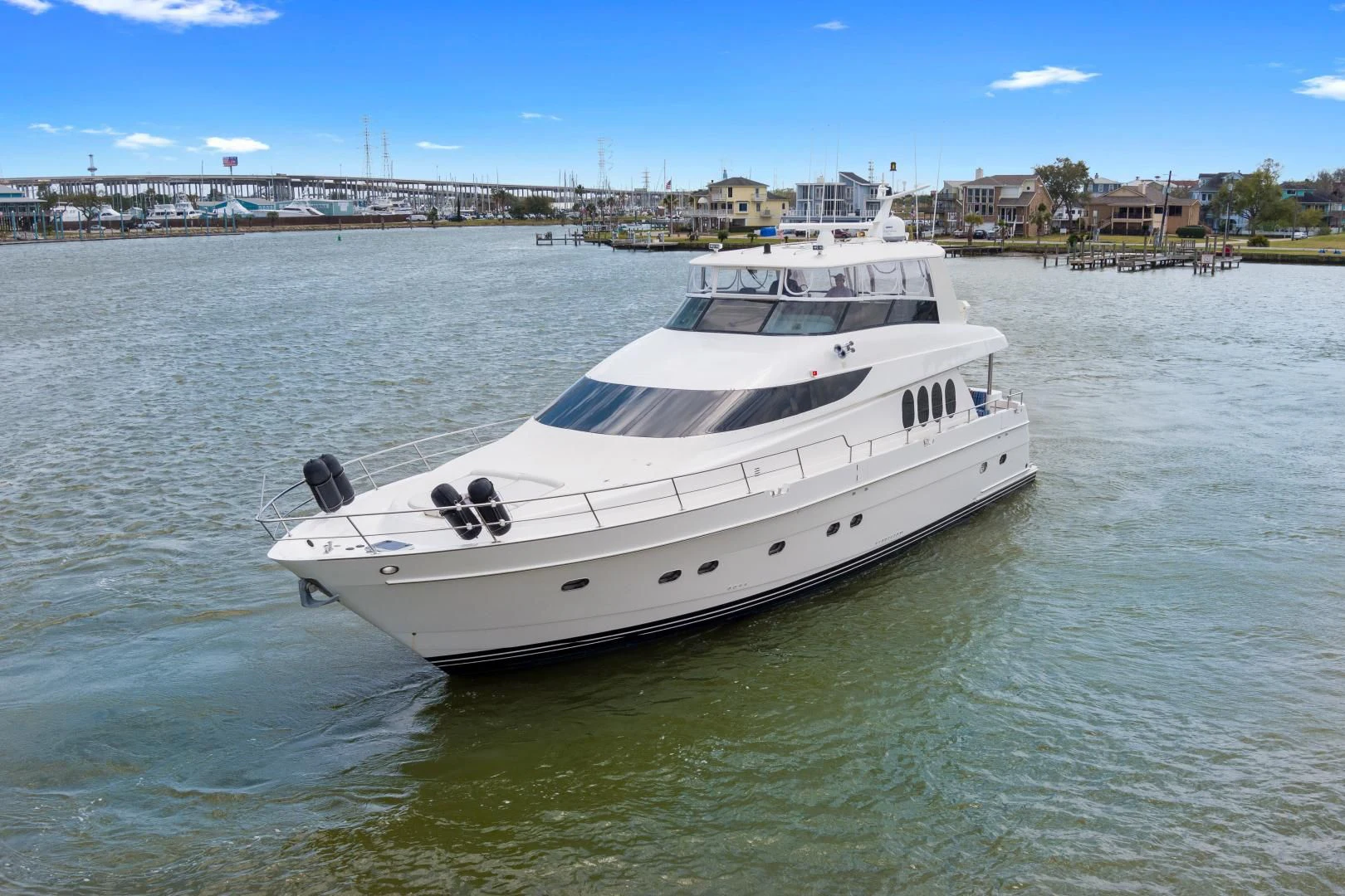 a white yacht in the water aboard CLEW LESS Yacht for Sale