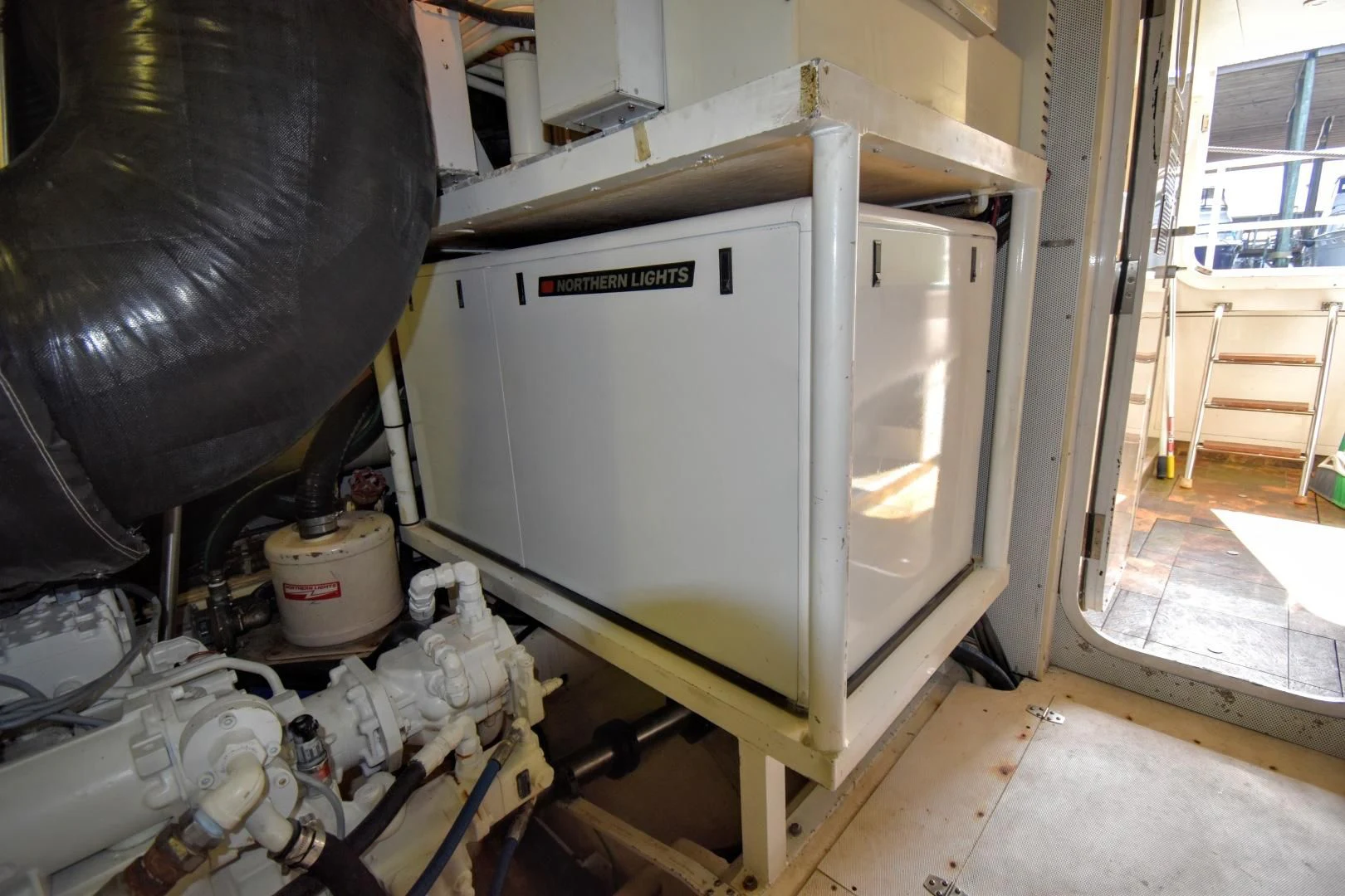a large white machine in a room aboard CLEW LESS Yacht for Sale