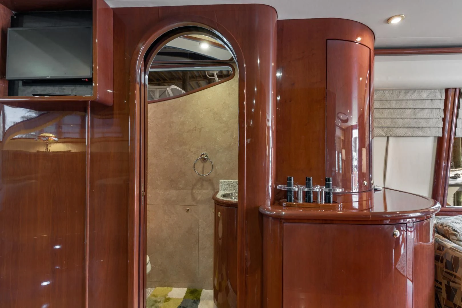 a room with a wood cabinet and a window with a wood cabinet aboard CLEW LESS Yacht for Sale