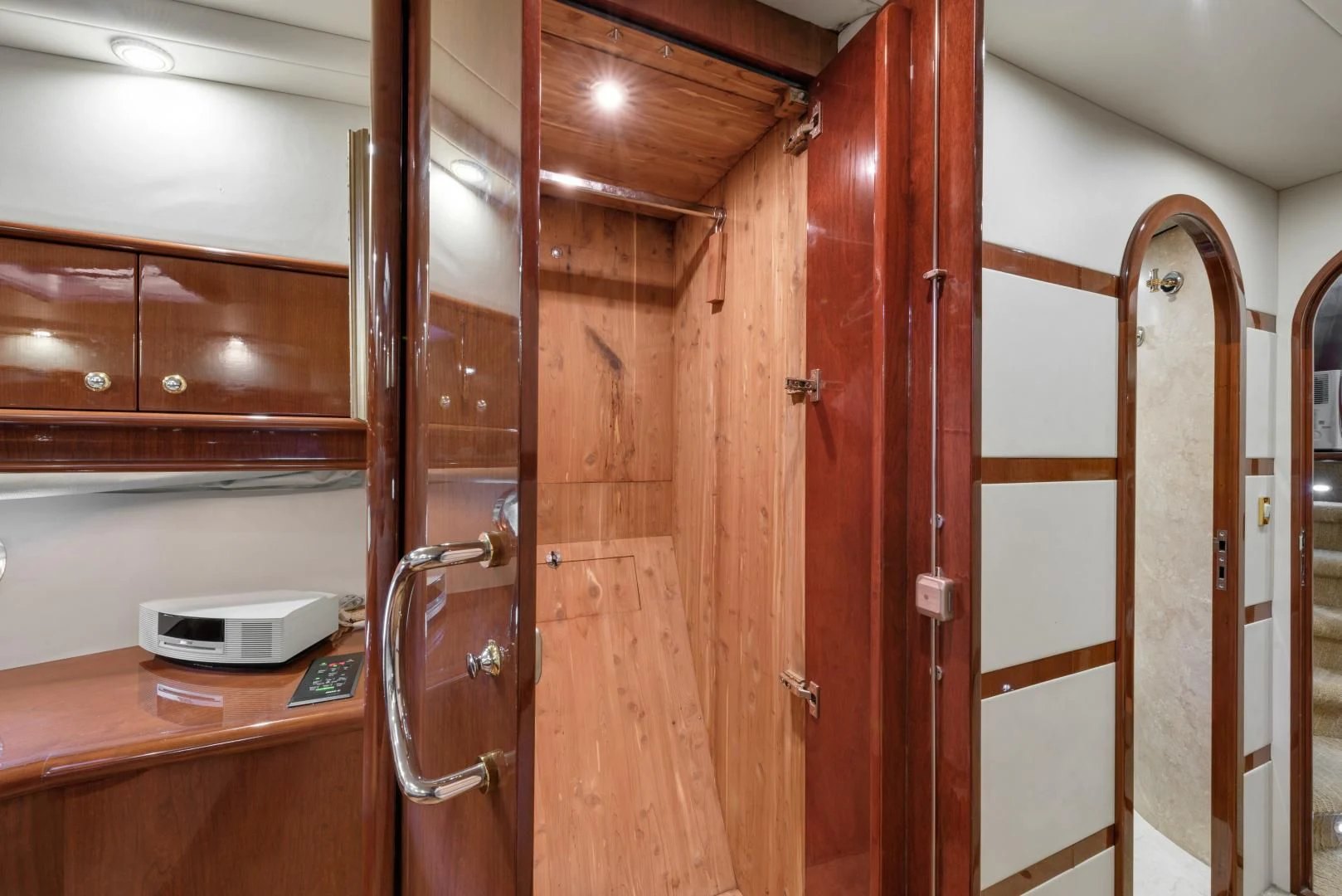 a room with wooden cabinets aboard CLEW LESS Yacht for Sale