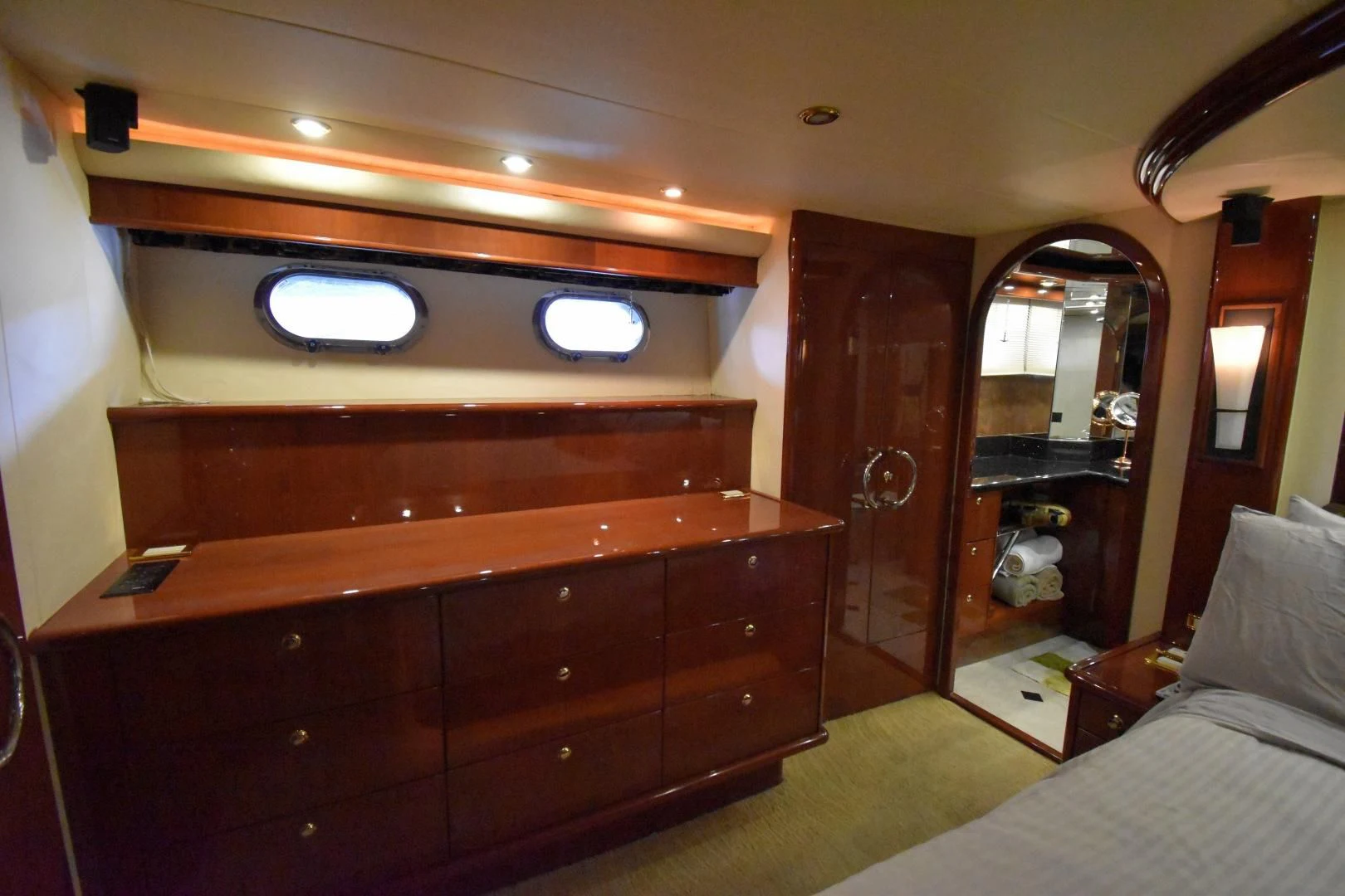 a room with a dresser and mirror aboard CLEW LESS Yacht for Sale