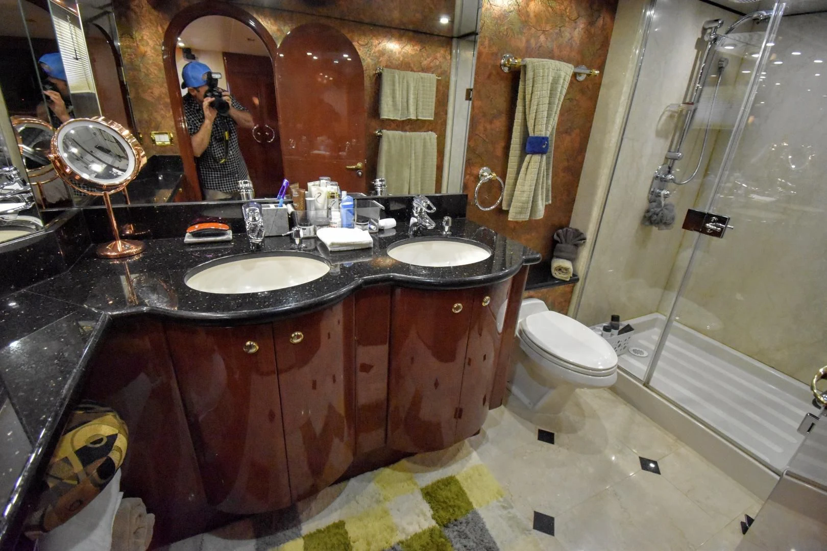 a bathroom with a large mirror aboard CLEW LESS Yacht for Sale