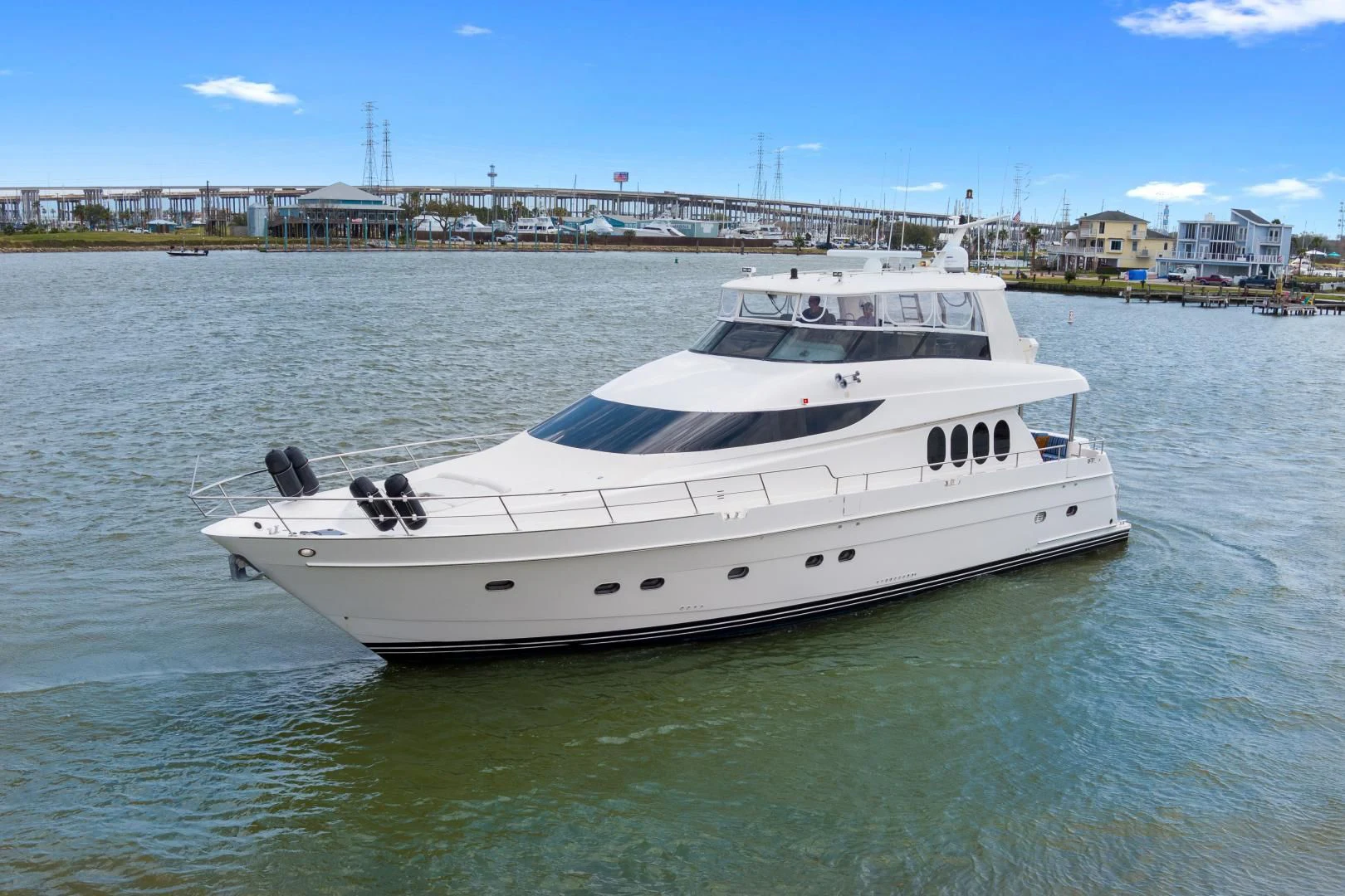 a white yacht on the water aboard CLEW LESS Yacht for Sale