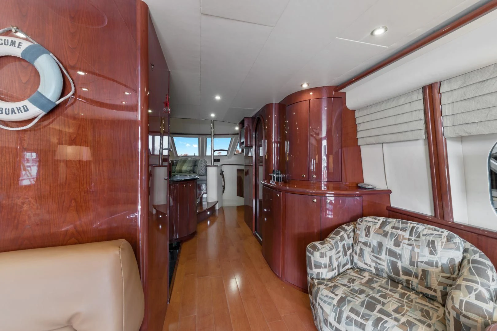 a room with a bed and a couch aboard CLEW LESS Yacht for Sale