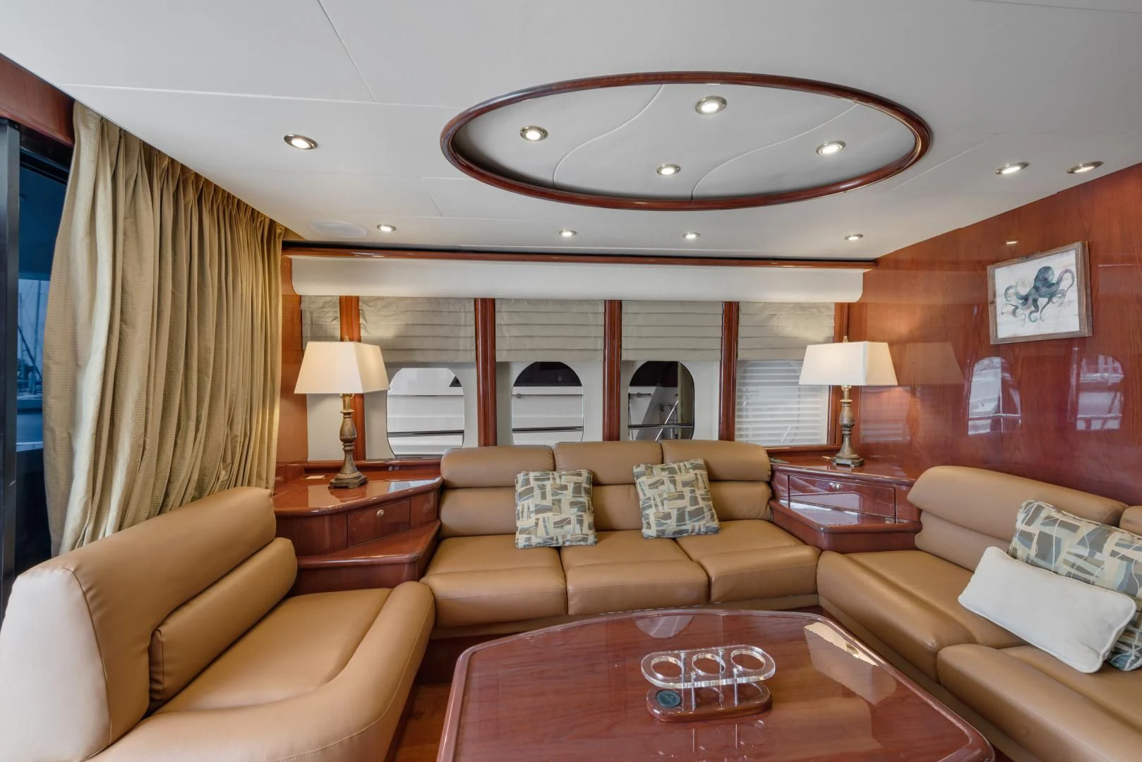 a living room with a large window aboard CLEW LESS Yacht for Sale