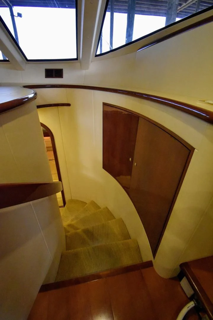 a room with a window and a table aboard CLEW LESS Yacht for Sale