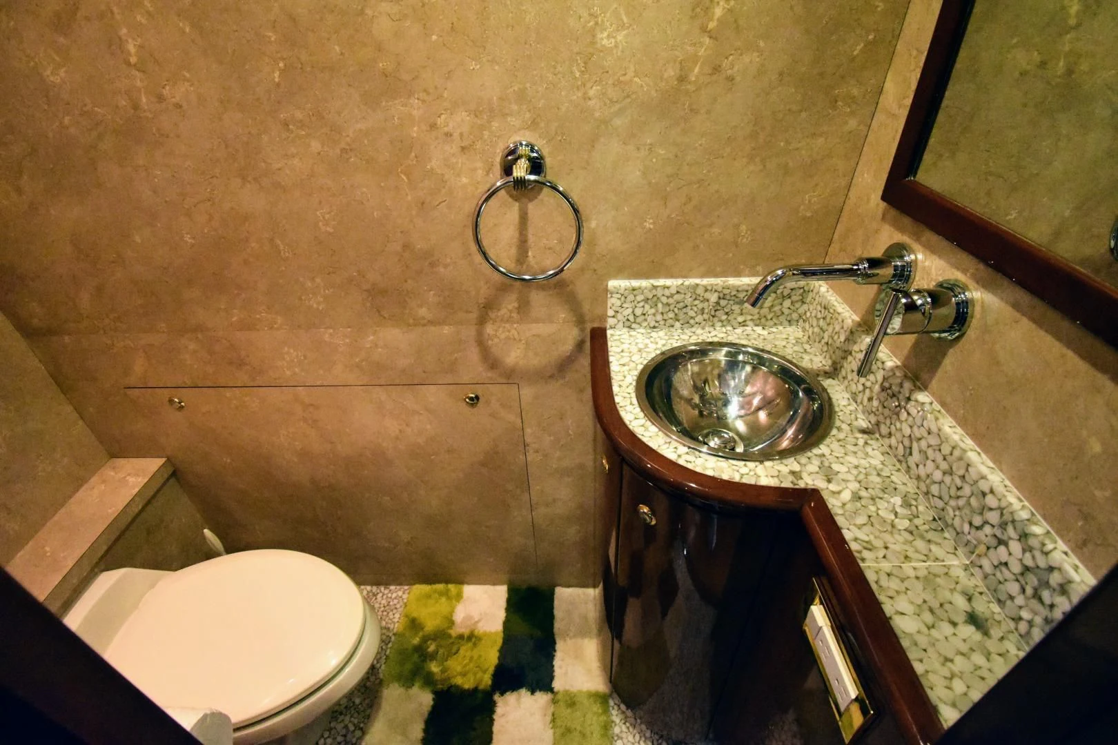 a bathroom with a sink and a toilet aboard CLEW LESS Yacht for Sale