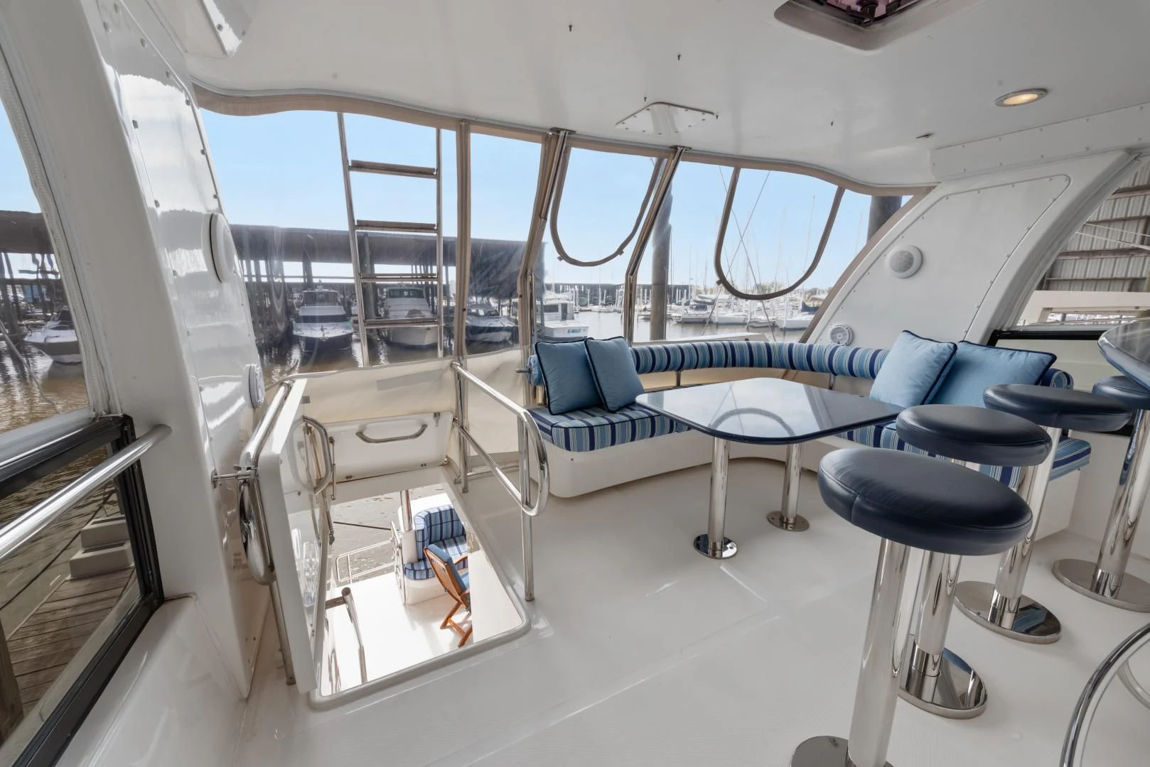 a room with a bed and a couch aboard CLEW LESS Yacht for Sale