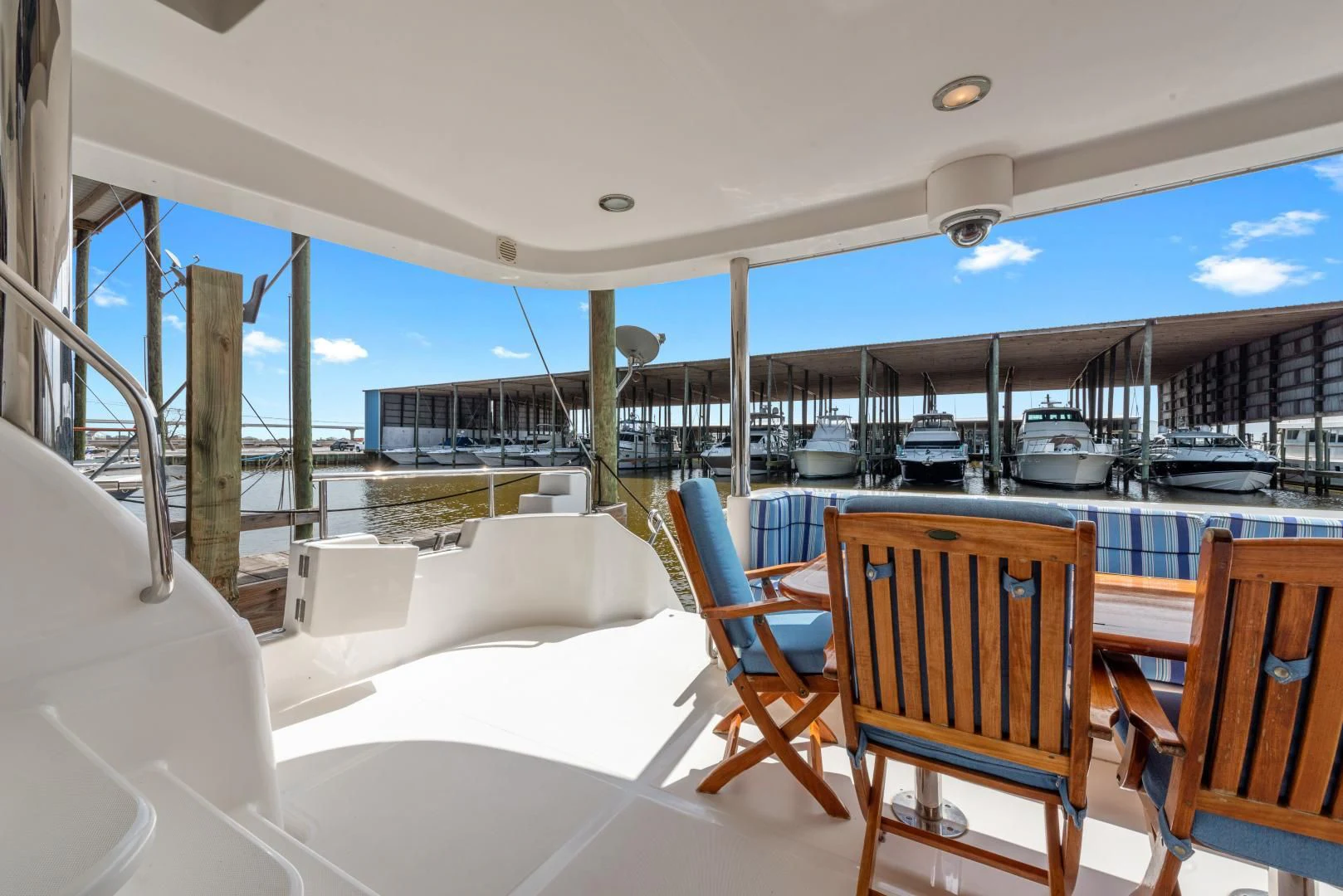 a room with a view of the water and boats aboard CLEW LESS Yacht for Sale