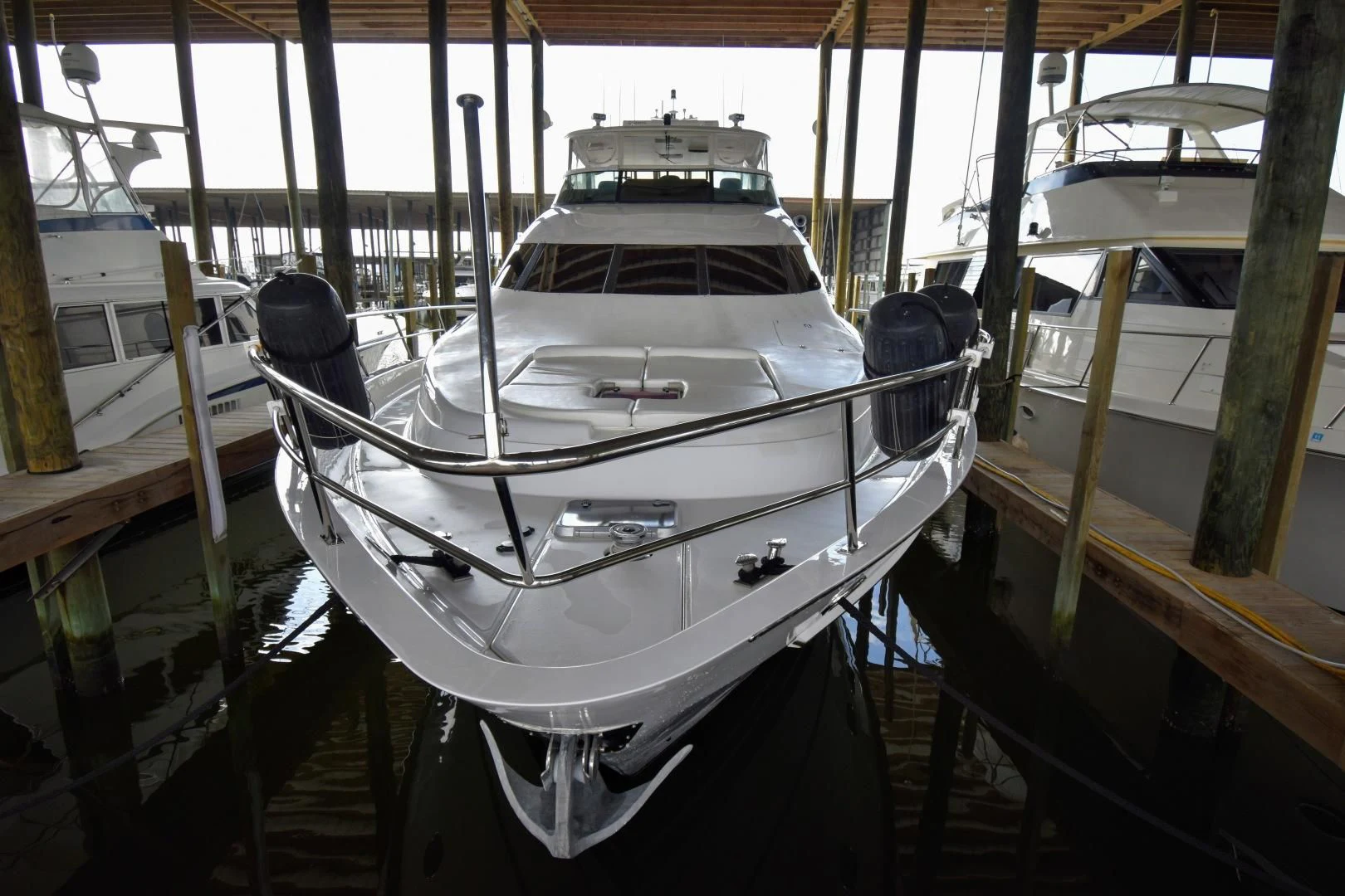 a boat docked in a harbor aboard CLEW LESS Yacht for Sale