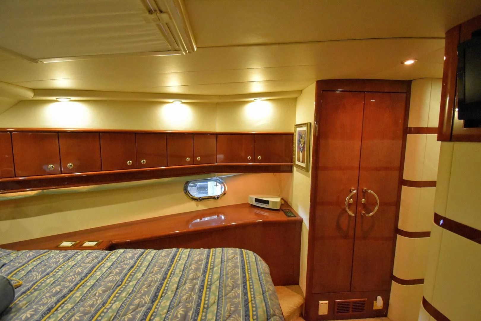 a room with a bed and a desk aboard CLEW LESS Yacht for Sale