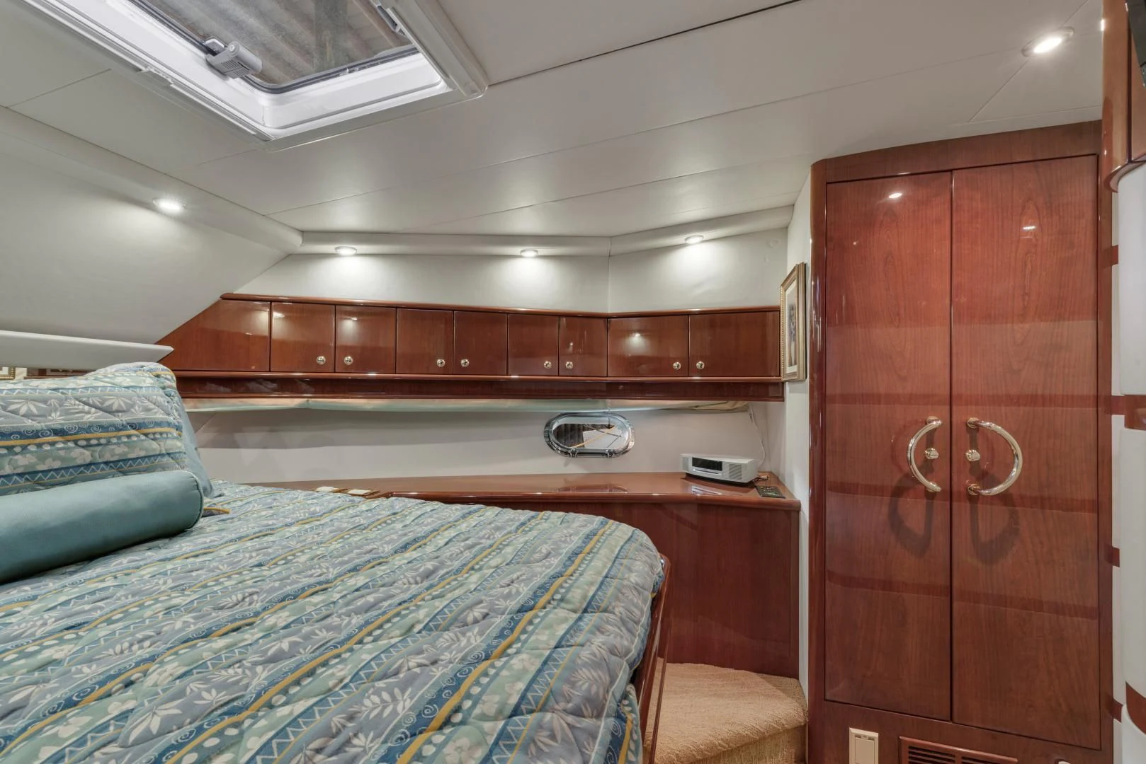 a room with wooden cabinets aboard CLEW LESS Yacht for Sale