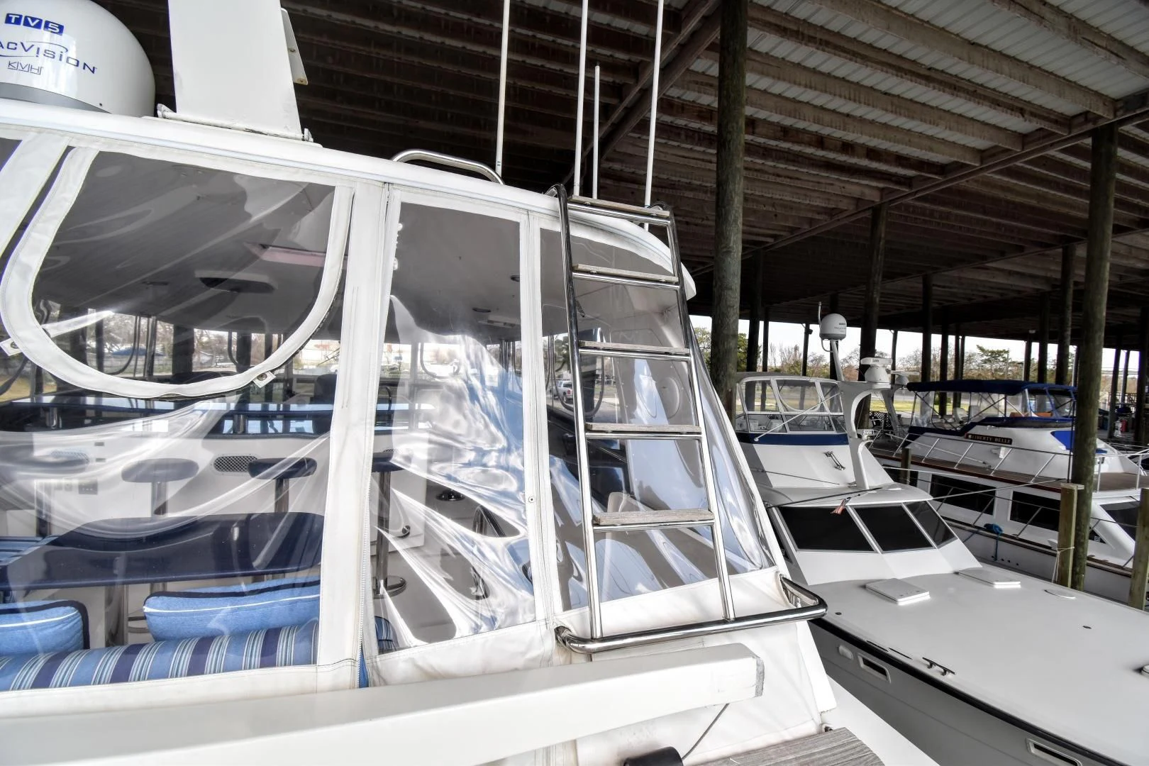 a large white boat in a large room aboard CLEW LESS Yacht for Sale