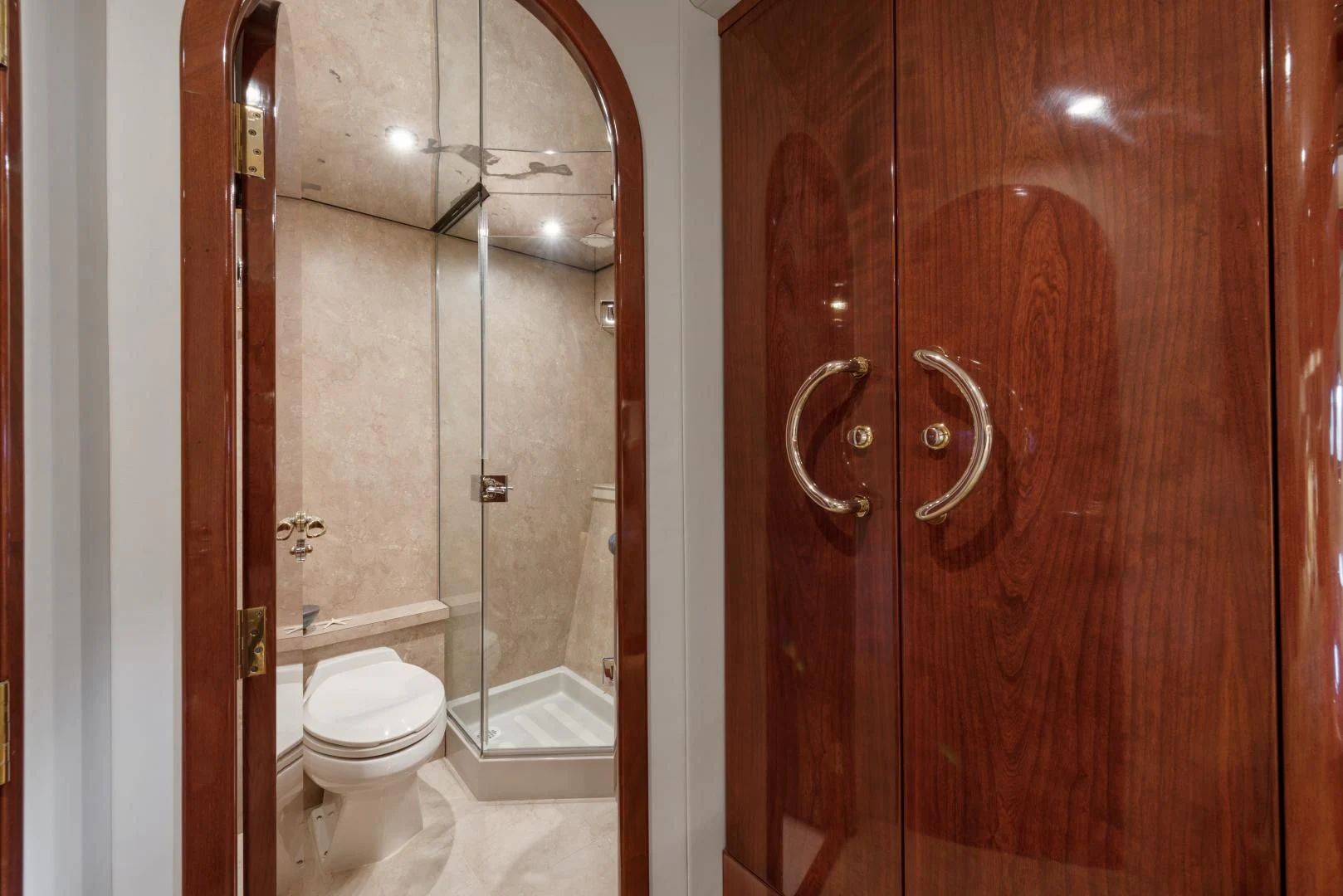 a bathroom with a toilet and a shower aboard CLEW LESS Yacht for Sale