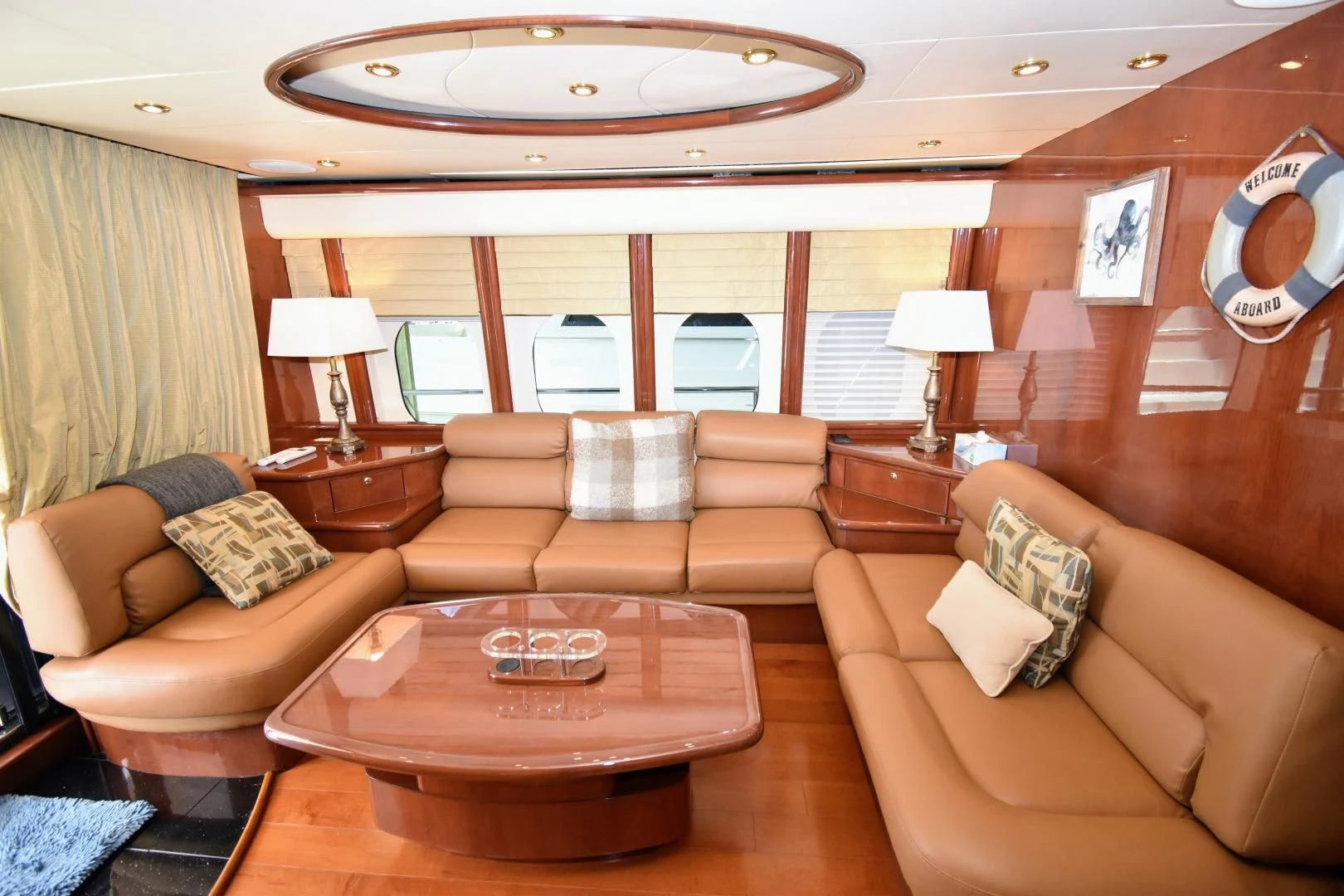 a living room with a large window aboard CLEW LESS Yacht for Sale