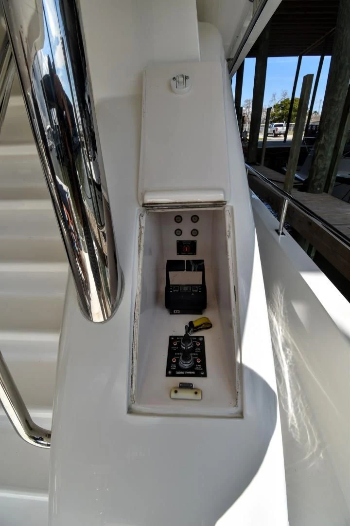 a white car with a door handle aboard CLEW LESS Yacht for Sale