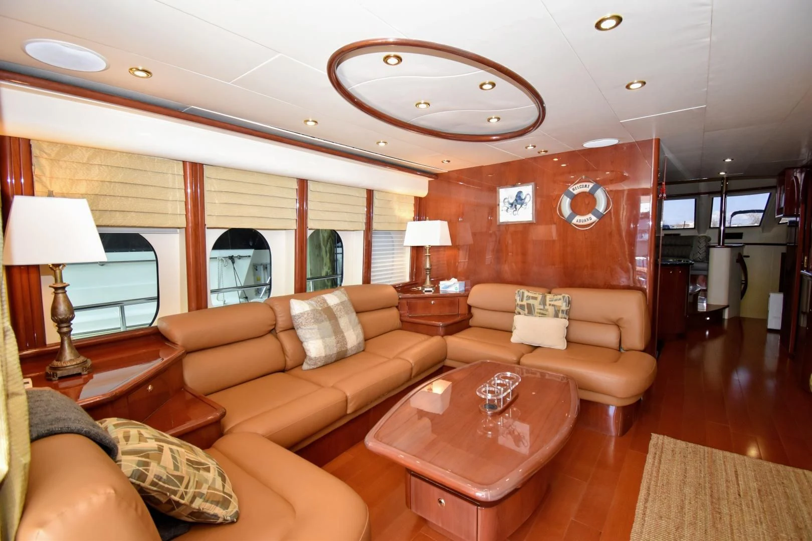 a living room with a large window aboard CLEW LESS Yacht for Sale