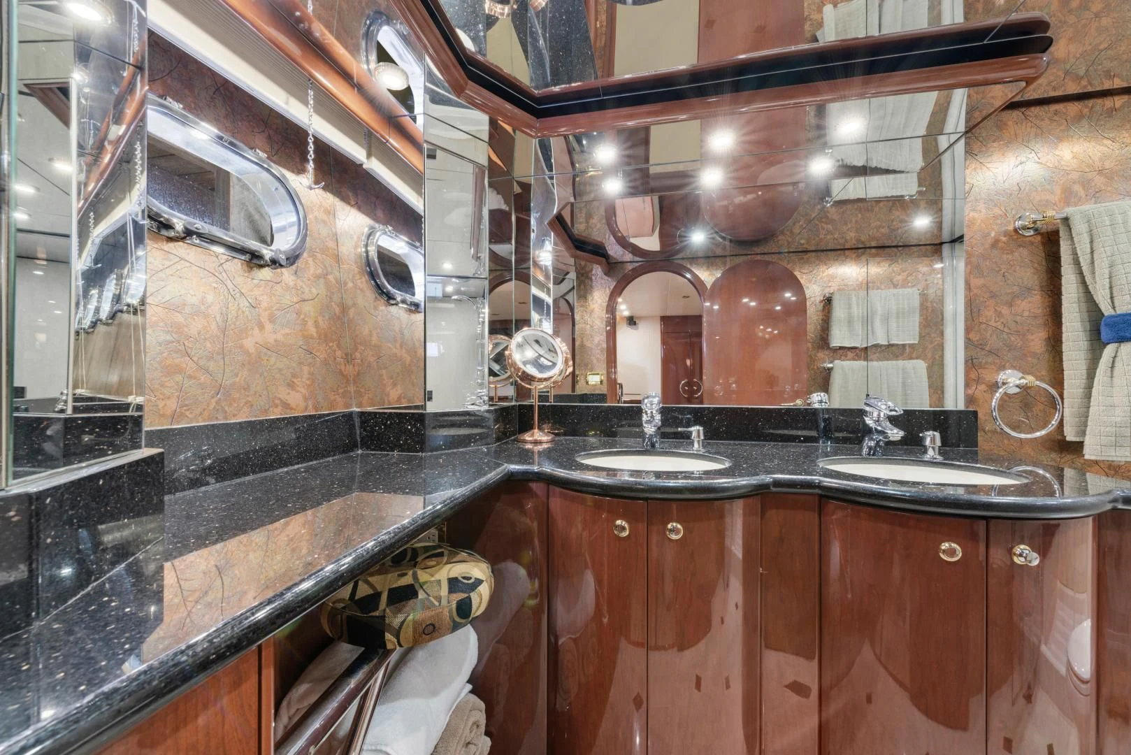 a bathroom with a large mirror aboard CLEW LESS Yacht for Sale