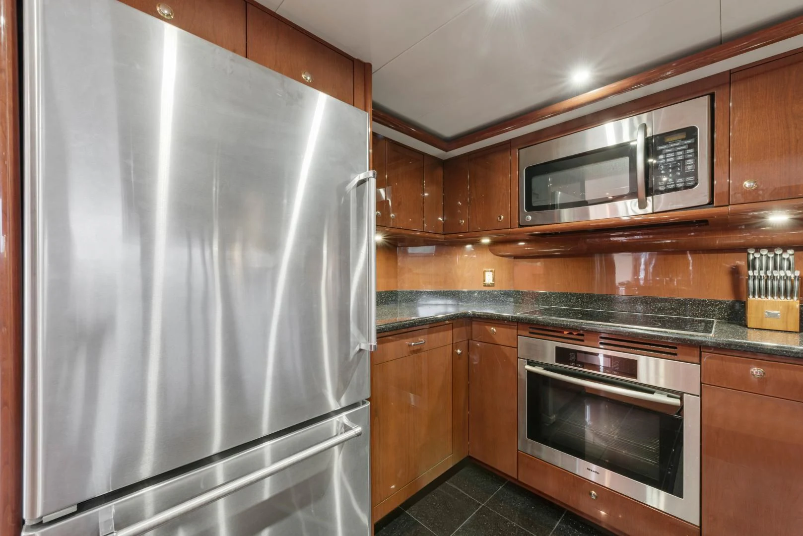 a kitchen with stainless steel appliances aboard CLEW LESS Yacht for Sale