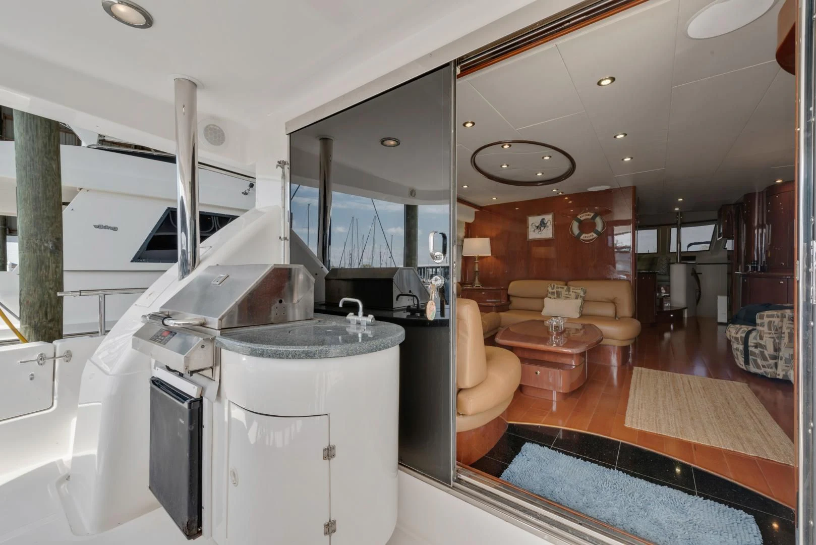 a kitchen with a sink and a refrigerator aboard CLEW LESS Yacht for Sale