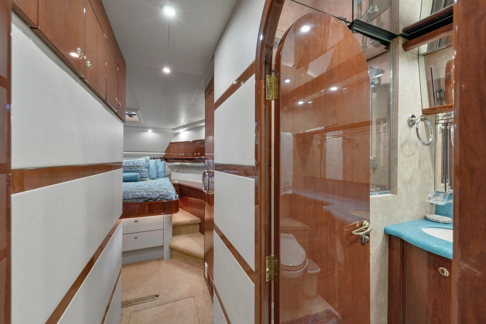 a bathroom with a glass shower aboard CLEW LESS Yacht for Sale