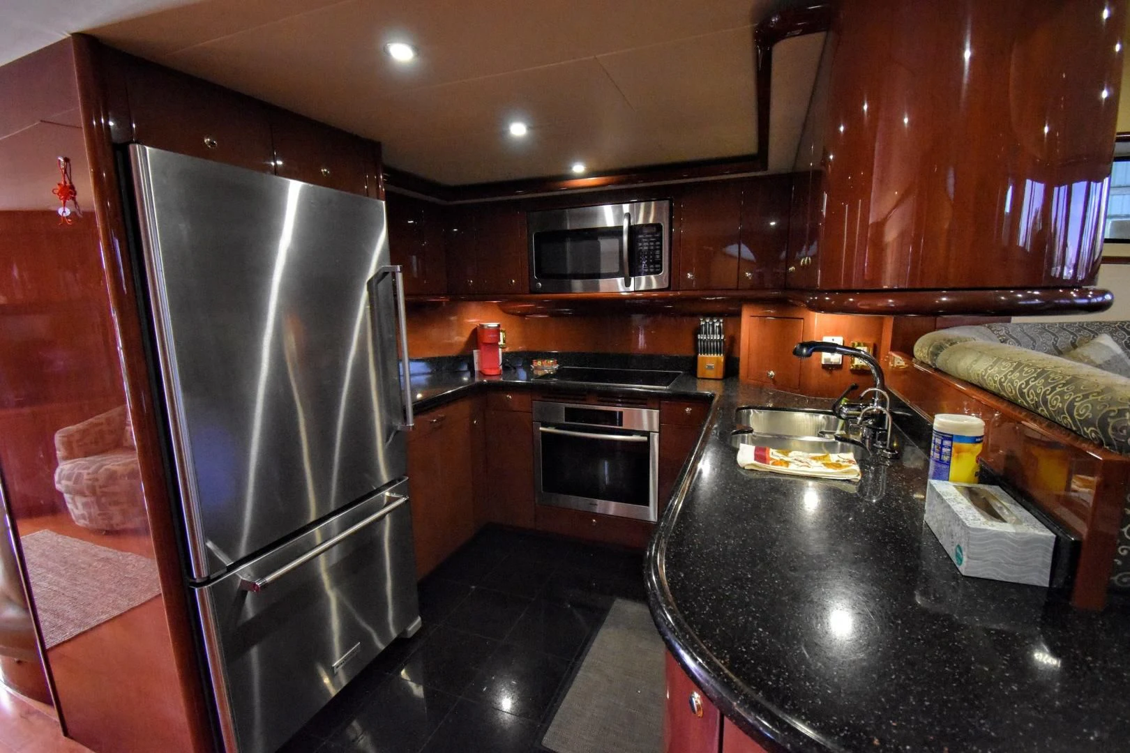 a kitchen with stainless steel appliances aboard CLEW LESS Yacht for Sale