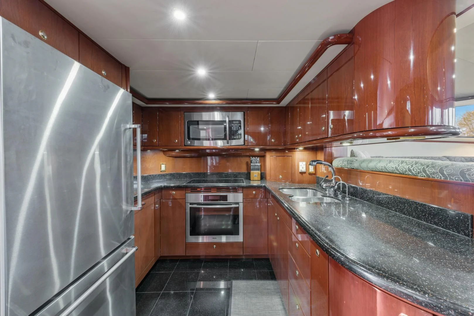 a kitchen with stainless steel appliances aboard CLEW LESS Yacht for Sale