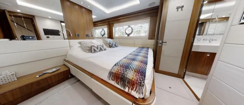 a room with a bed and a sink aboard LUCKY GIRLS Yacht for Sale