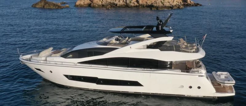 a white yacht on the water aboard LUCKY GIRLS Yacht for Sale