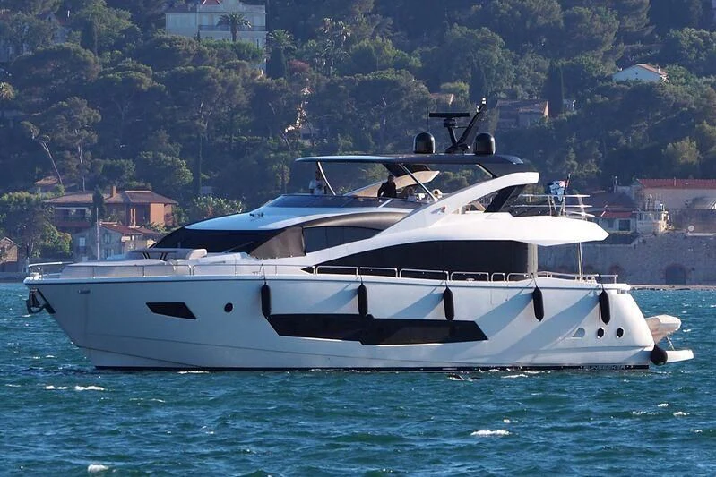 a white yacht on the water aboard LUCKY GIRLS Yacht for Sale