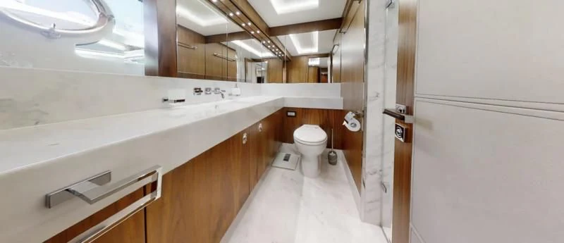 a bathroom with a toilet and a sink aboard LUCKY GIRLS Yacht for Sale