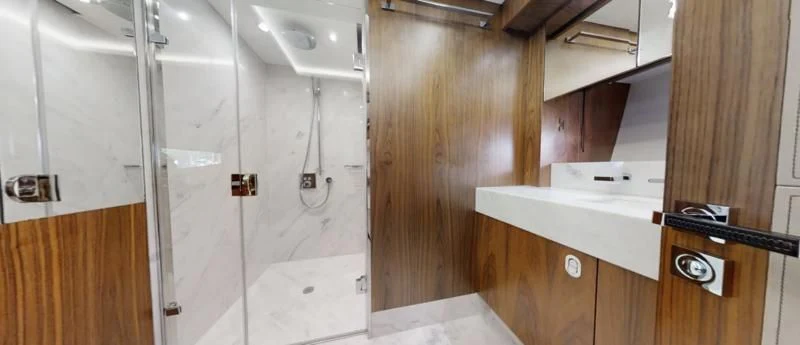 a room with a sink and cabinets aboard LUCKY GIRLS Yacht for Sale