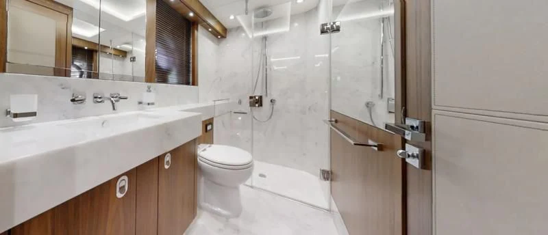 a bathroom with a sink and a toilet aboard LUCKY GIRLS Yacht for Sale