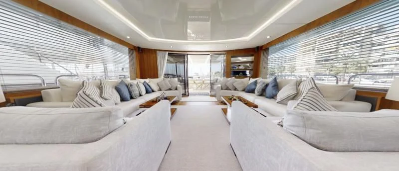 a room with a bed and a couch aboard LUCKY GIRLS Yacht for Sale