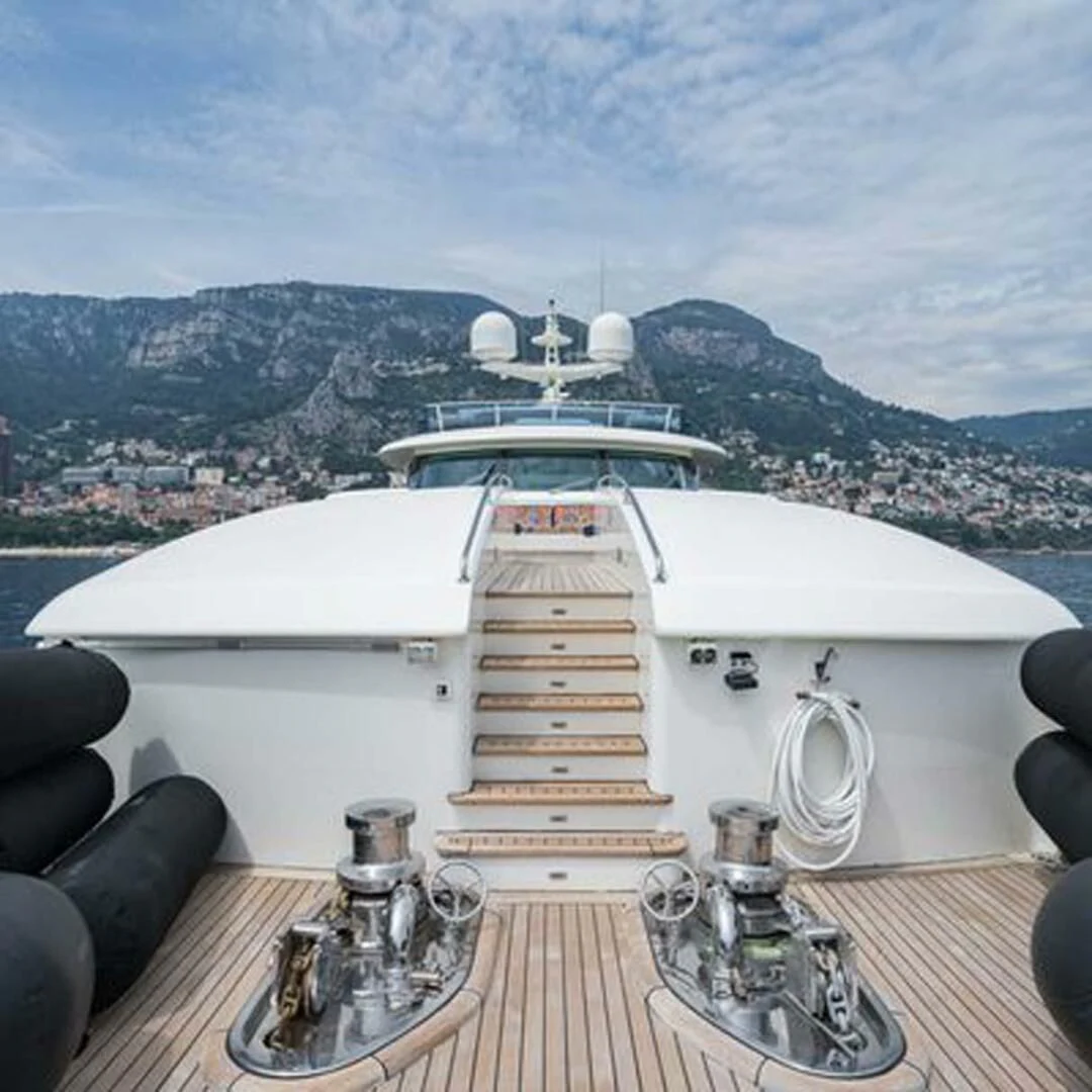 a large white building with a dome and a view of a city aboard IRAMA Yacht for Sale